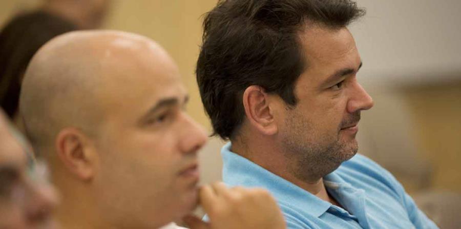Miembros de la Junta de Gobierno del PPD han pedido a Héctor Ferrer (izq.) y a Roberto Prats (der.) que expliquen sus vínculos con la empresa de cabildeo y relaciones públicas DCI Group. (horizontal-x3)
