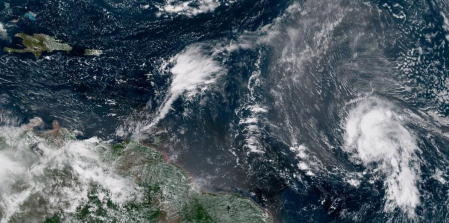 Imagen de satélite en la que se observan los remanentes de la depresión tropical 11 y los remanentes de Kirk. (Captura / NOAA) (horizontal-x3)