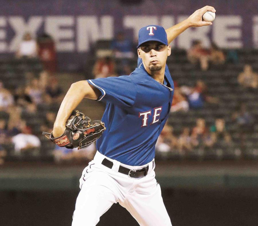Alex Claudio, de los Vigilantes de Texas, estará en uniforme desde el 15 de diciembre. (Archivo / AP) (semisquare-x3)
