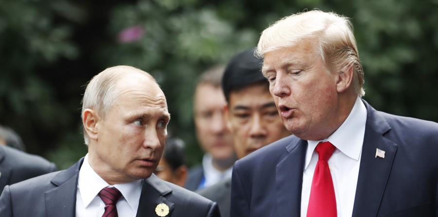 El presidente de Rusia, Vladimir Putin, junto al presidente de EE.UU. Donald Trump (horizontal-x3)