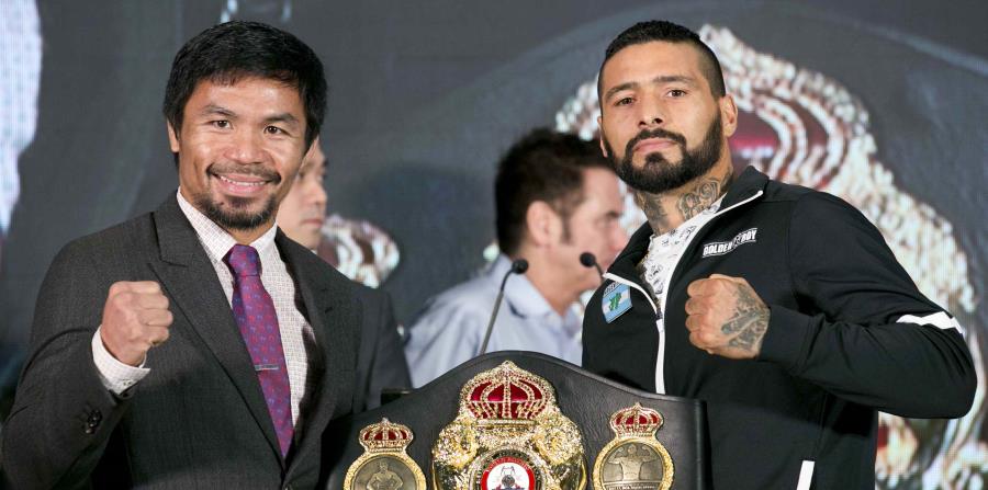Manny Pacquio y Lucas Matthysse posan con el título wélter de la Asociación Mundial de Boxeo. (AP) (horizontal-x3)