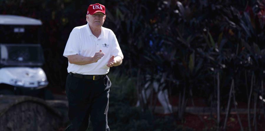 El presidente en su campo de golf en Florida el pasado diciembre. (AP) (horizontal-x3)