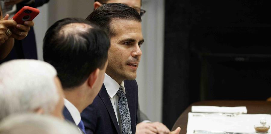 Ricardo Rossello speaks to President Donald Trump during a lunch with governors in the Roosevelt Room of the White House (horizontal-x3)