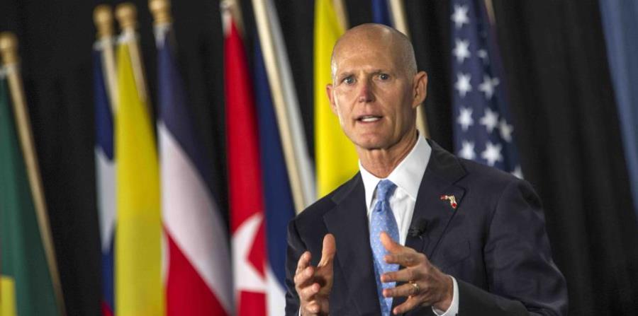 El gobernador de Florida, Rick Scott (horizontal-x3)