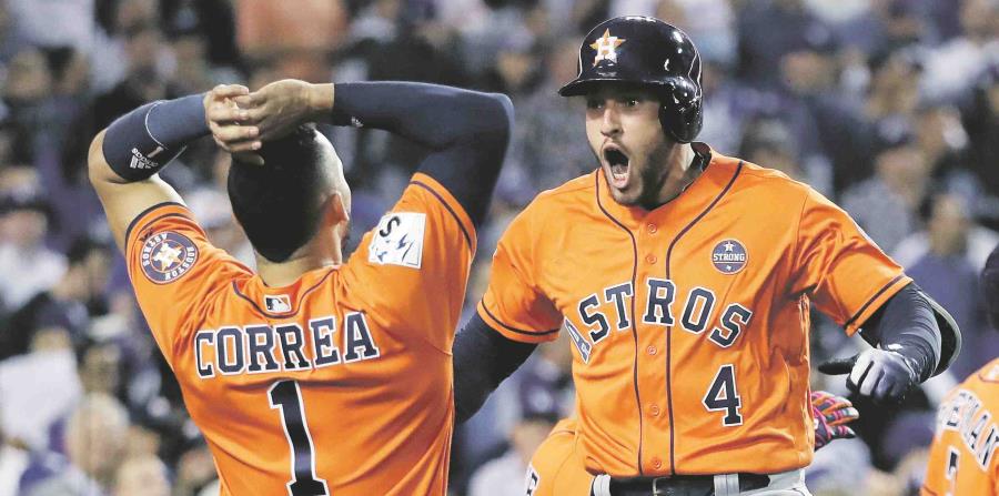 Los peloteros boricuas Carlos Correa y George Springer forman parte del equipo ganador de los Astros de Houston. (horizontal-x3)