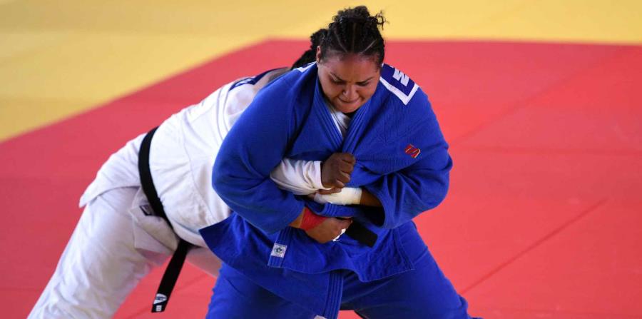 Melissa Mojica (azul) versus Idalys Ortiz de Cuba en Barranquilla 2018. (horizontal-x3)