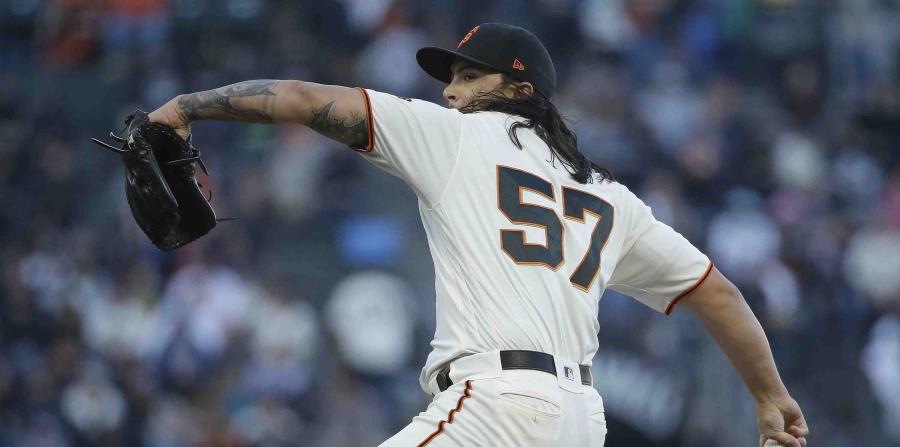 Dereck Rodríguez trabaja en la primera entrada contra los Astros. (AP) (horizontal-x3)