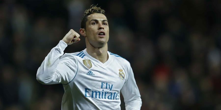 Cristiano Ronaldo celebra luego de anotar un gol contra el Real Sociedad. (AP) (horizontal-x3)