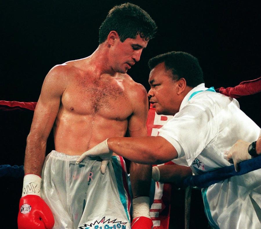 Josué Márquez (der.) entrenó a muchos boxeadores, incluyendo a Wilfredo Rivera, quien tuvo tres oportunidades titulares. (GFR Media) (semisquare-x3)