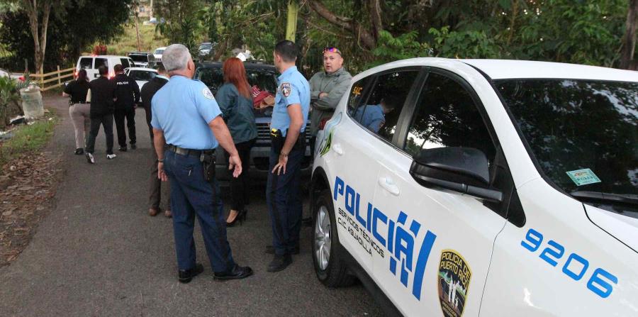 Agentes de la Policía investigan la escena de un crimen. (GFR Media) (horizontal-x3)