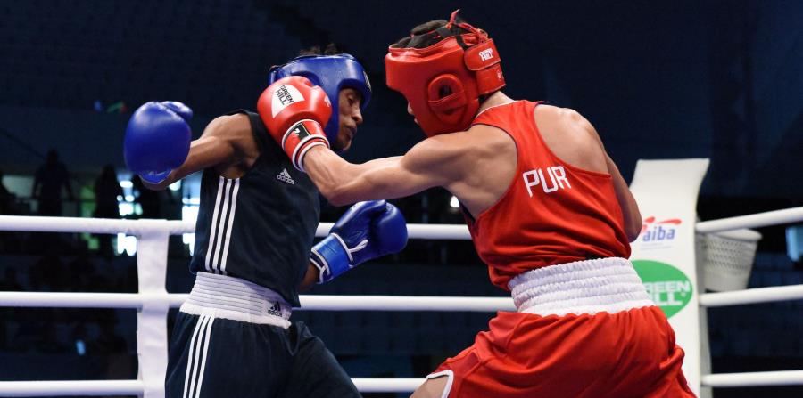 Jan Paul Rivera (rojo) venció por decisión al etíope Endashaw Mekonnen Alayu (azul). (AIBA) (horizontal-x3)