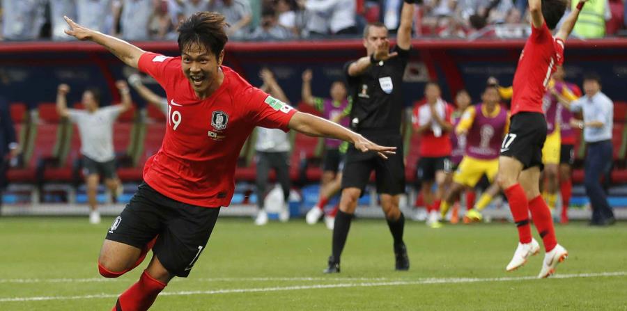 Kim Young-gwon anotó uno de los de Corea del Sur contra Alemania. (AP) (horizontal-x3)