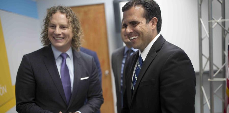Ricardo Rosselló y John Paul Farmer (horizontal-x3)