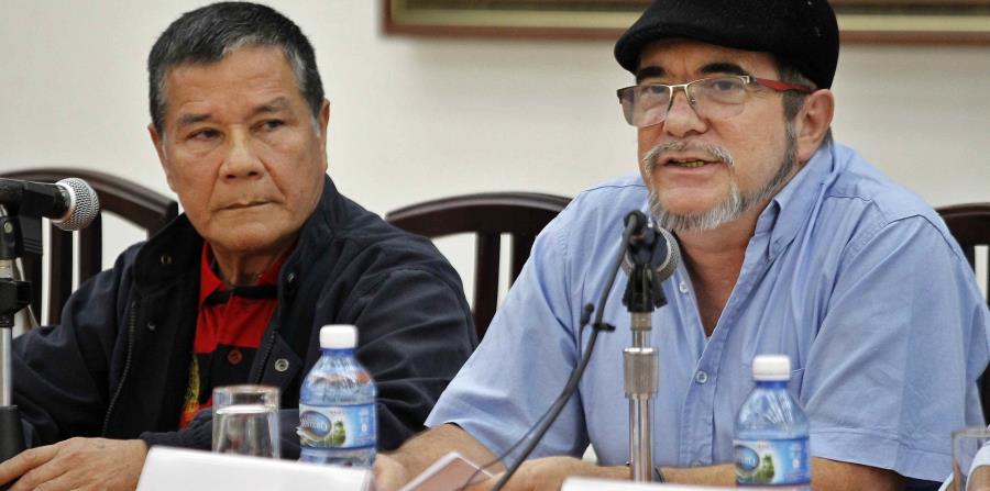 El máximo líder del ELN, Nicolás Rodríguez, alias Gabino, y el comandante de las FARC Rodrigo Londoño, alias ?Timoleón Jiménez?,ofrecen una rueda de prensa conjunta. (horizontal-x3)