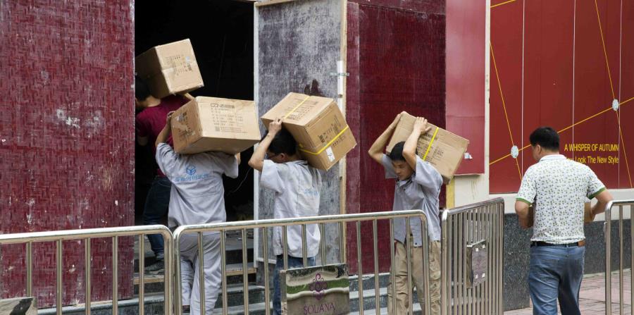 China prometió tomar represalias por el mismo monto. (AP) (horizontal-x3)