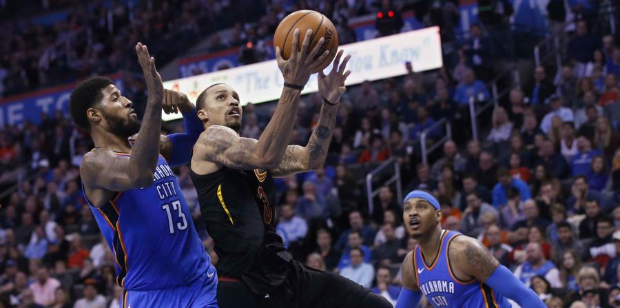 George Hill, con el balón, fue cambiado a Milwaukee. (AP) (horizontal-x3)