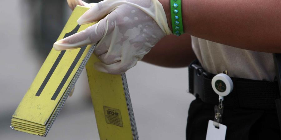 El occiso presentaba múltiples heridas de balas en diferente parte del cuerpo. (GFR Media) (horizontal-x3)