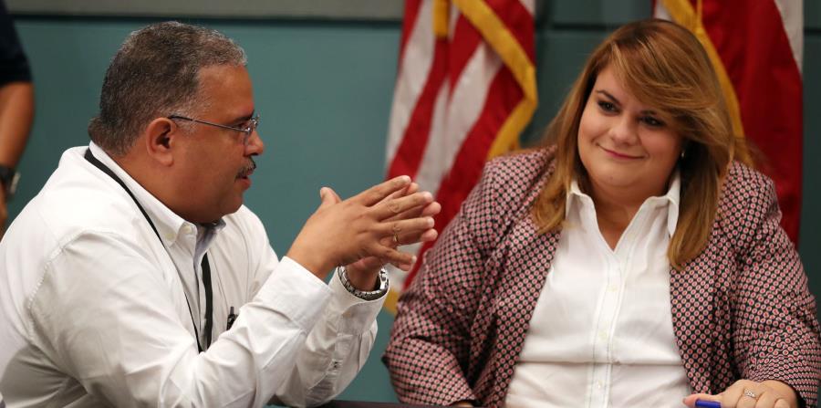 El secretario de Salud, quien aparece en la foto junto a la comisionada residente, Jenniffer González, indicó que la asignación de fondos para el Medicaid se logró tras meses de cabildeo. (horizontal-x3)