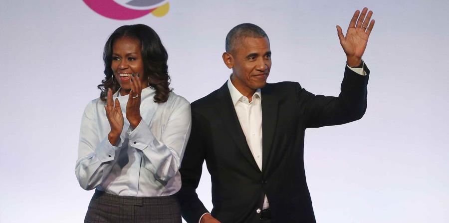 el expresidente de Estados Unidos, Barack Obama (derecha), y su esposa, Michelle Obama, a su llegada a la primera edición de la Cumbre de la Fundación Obama en Chicago. (horizontal-x3)