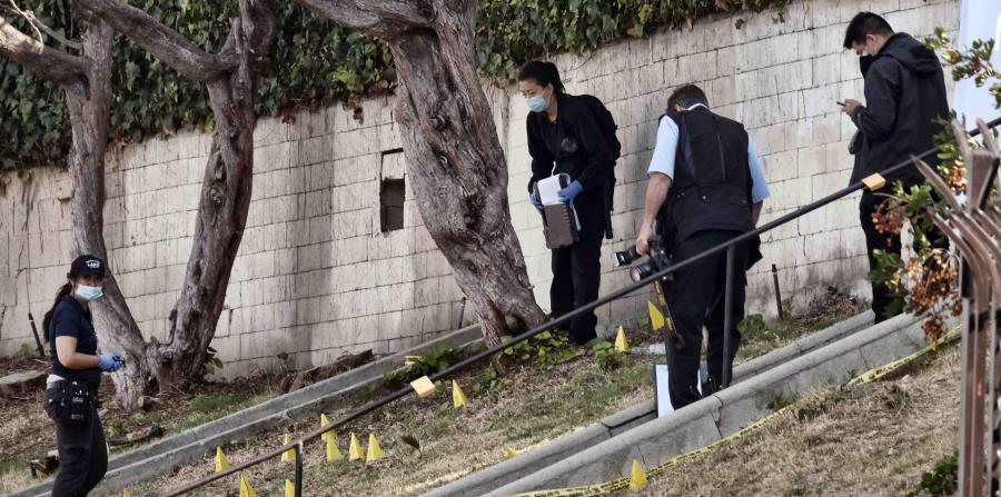 Se prevé que los tres policías heridos por el sospechoso sobrevivirán. (AP / Richard Vogel) (horizontal-x3)