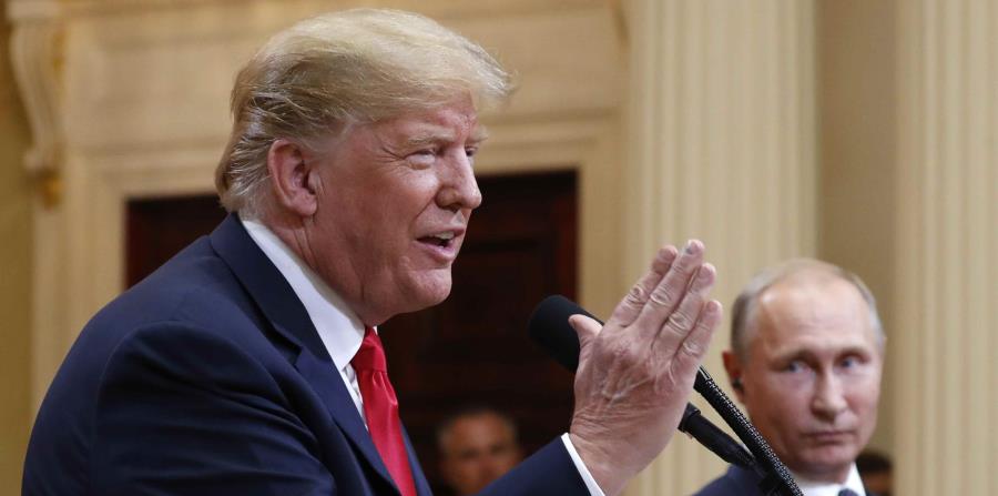 El presidente estadounidense Donald Trump habla durante una conferencia de prensa con su homólogo ruso Vladimir Putin en el Palacio Presidencial de Helsinki, Finlandia, el lunes 16 de julio de 2018. (AP Foto/Pablo Martínez Monsivais) (horizontal-x3)