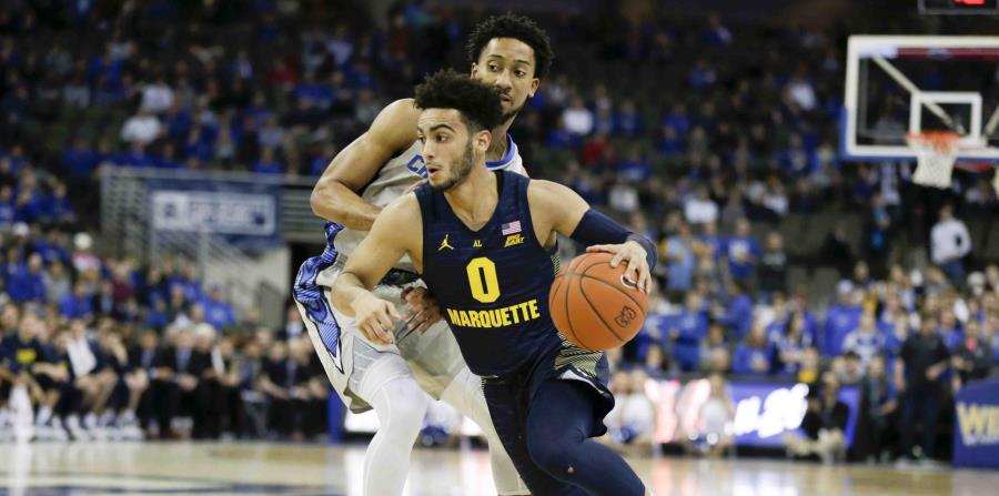 Markus Howard atinó 10 triples en 14 intentos en la victoria de Marquette. (AP) (horizontal-x3)