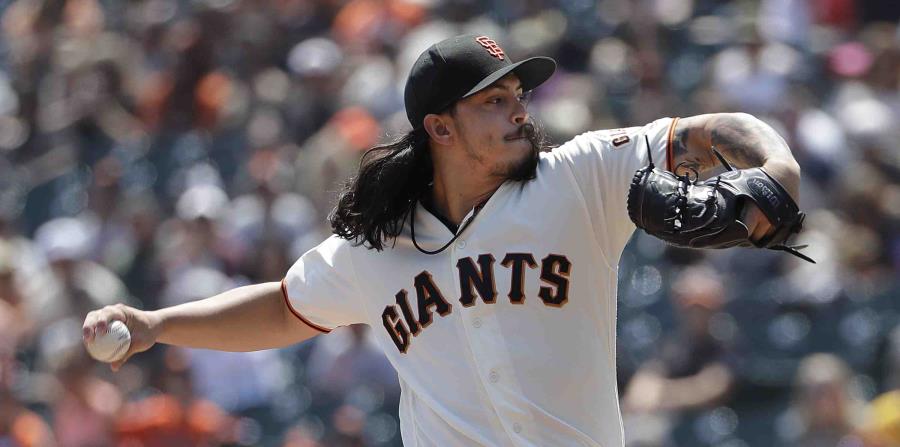 Iván Dereck Rodríguez, quien estaba supuesto a lanzar en la jornada del viernes ante los Rojos de Cincinnati, se lastimó en medio de la pelea entre su compañero Nick Hundley y el cubano Yasiel Puig, de los Dodgers, el miércoles. (AP / Jeff Chiu) (horizontal-x3)