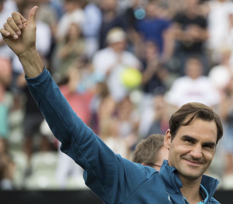 El tenista suizo Roger Federer saborea la victoria. (semisquare-x3)