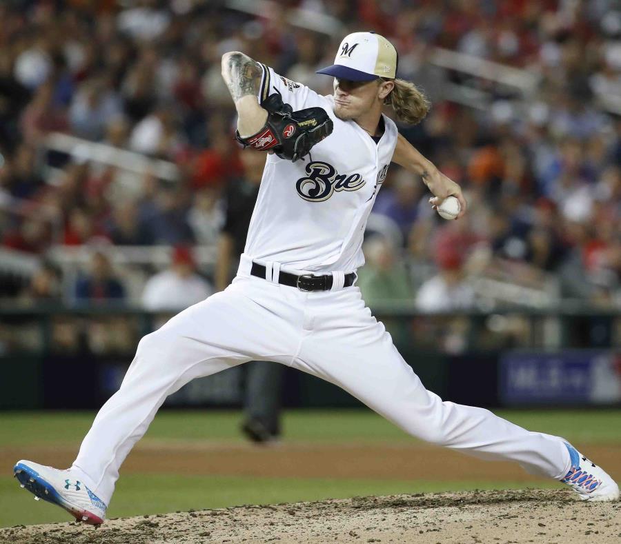 El pitcher de los Cerveceros de Milwaukee Josh Hader trabaja en la octava entrada del Juego de Estrellas el martes 17 de julio de 2018 en Washington. (AP) (semisquare-x3)