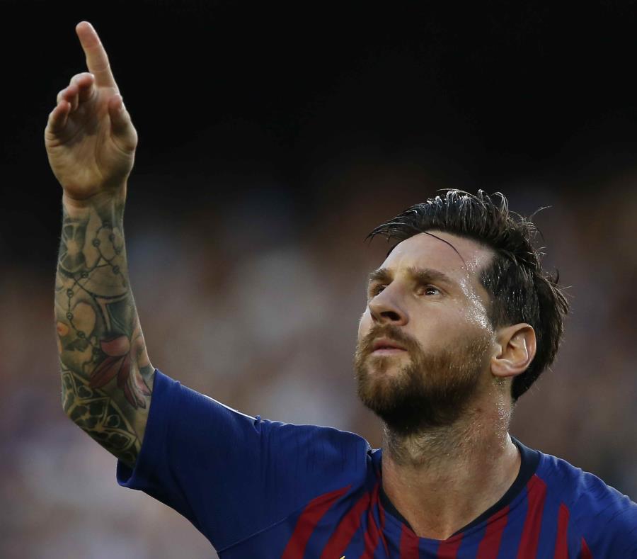 Lionel Messi celebra su primer gol en el partido. (AP) (semisquare-x3)
