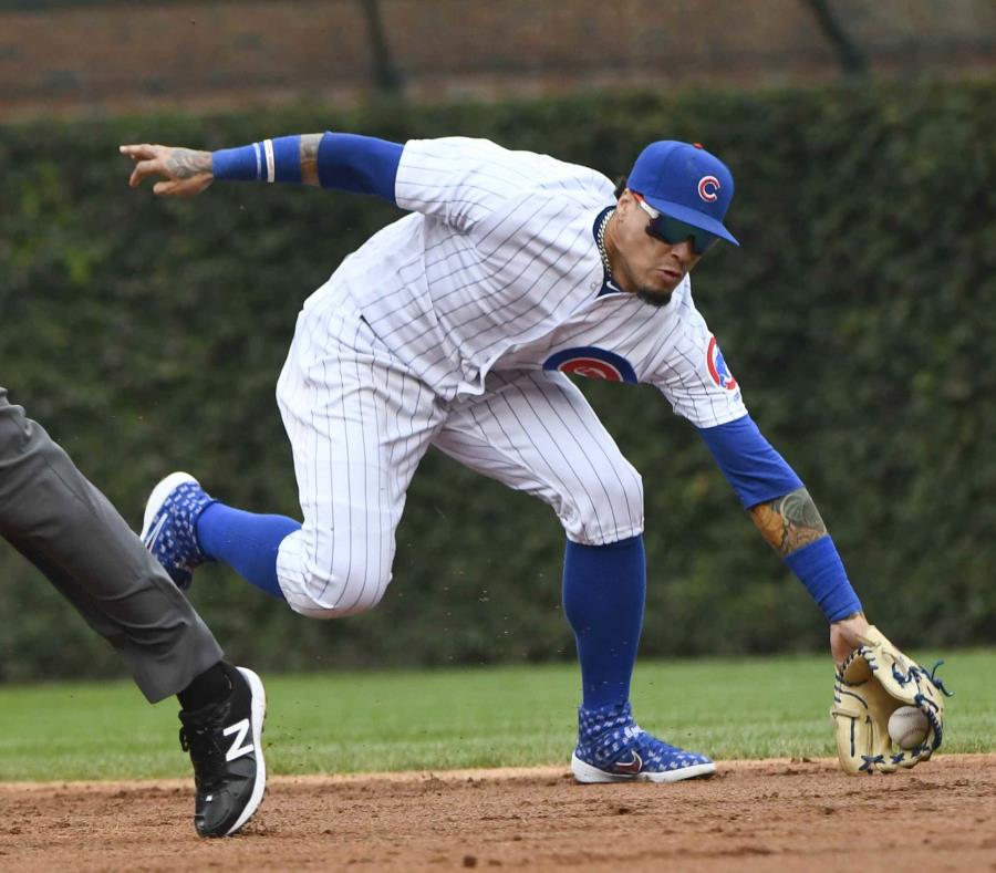 Javier Báez es finalista por primera vez para un premio de Guante de Oro. (AP) (semisquare-x3)