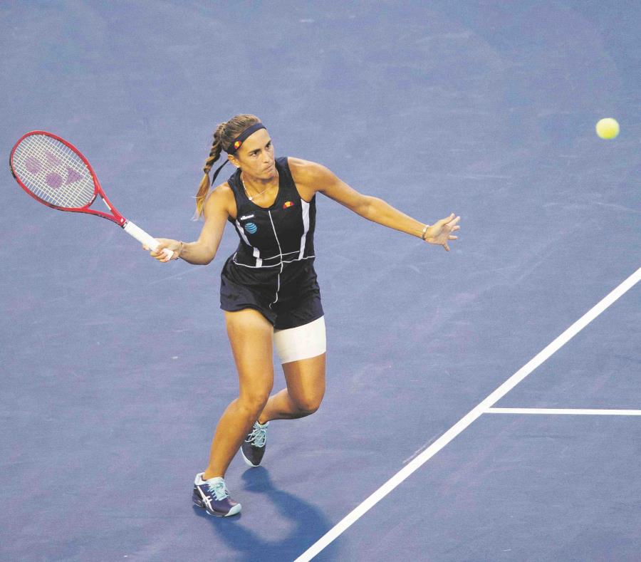 Mónica Puig, la campeona olímpica, dio cuenta 6-2, 6-2 de la bielorrusa Aliaksandra Sasnovich. (Michael Cummo / Hearst Connecticut Media vía AP) (semisquare-x3)