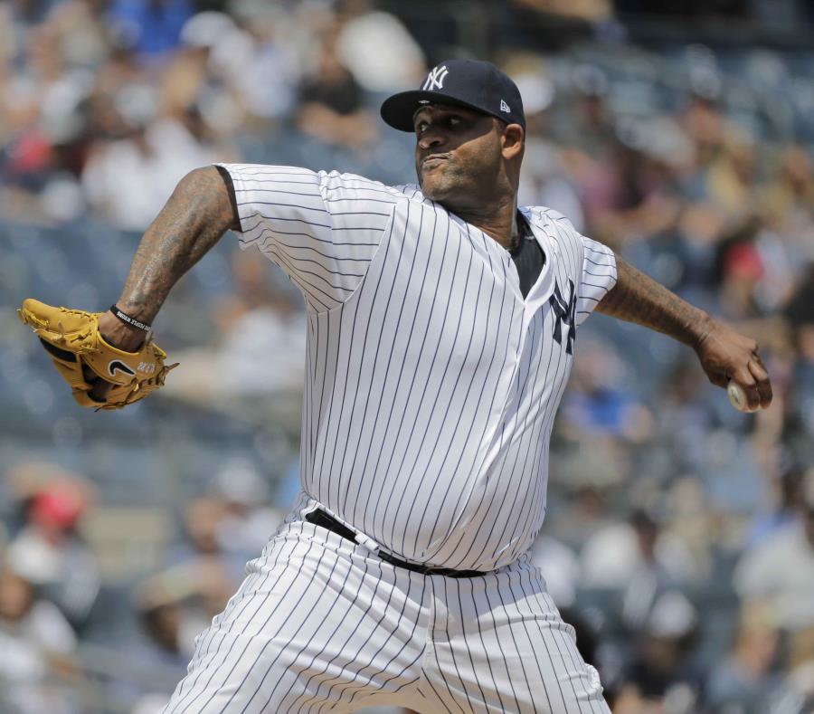 El abridor CC Sabathia lanza por los Yankees de Nueva York en duelo con los Vigilantes de Texas. (AP / Seth Wenig) (semisquare-x3)