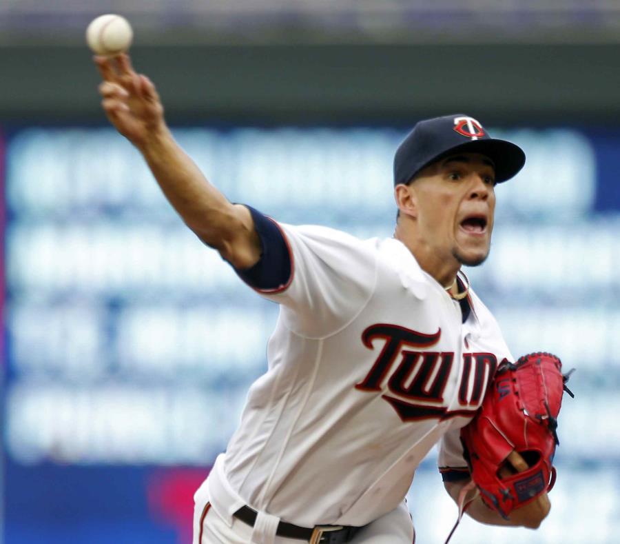 José Berríos realiza un lanzamiento en el partido contra los Tigres de Detroit. (AP / Jim Mone) (semisquare-x3)