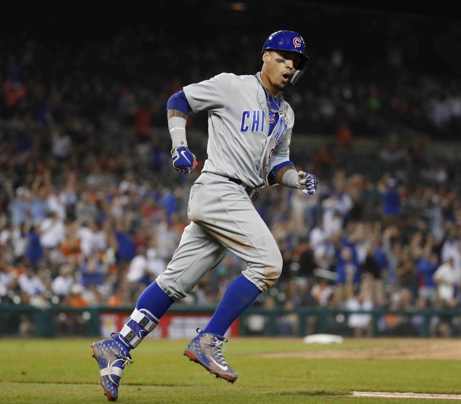 Javier Báez corre las bases después de su cuadrangular en la novena entrada. (AP) (semisquare-x3)