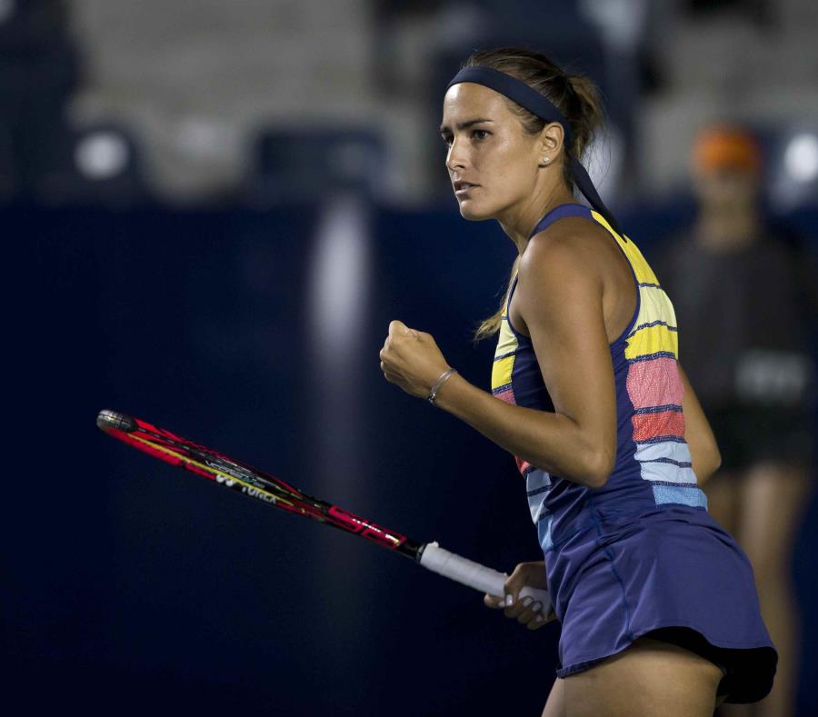 Mónica Puig entró al partido como la número 50 del mundo, tras ver un ascenso de cinco posiciones en la actualización del lunes del escalafón de la Asociación de Tenis Femenino. (EFE / Miguel Sierra) (semisquare-x3)