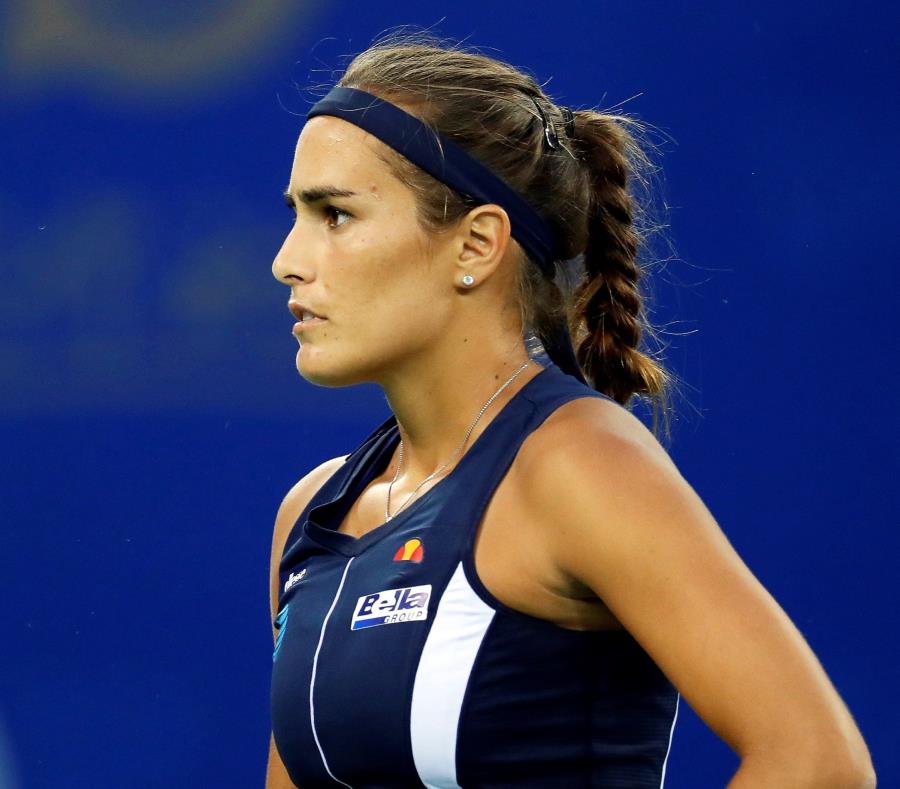 La tenista puertorriqueña Mónica Puig reacciona durante su partido del torneo WTA de Wuhan contra la china Qiang Wang, en Wuhan, China (semisquare-x3)