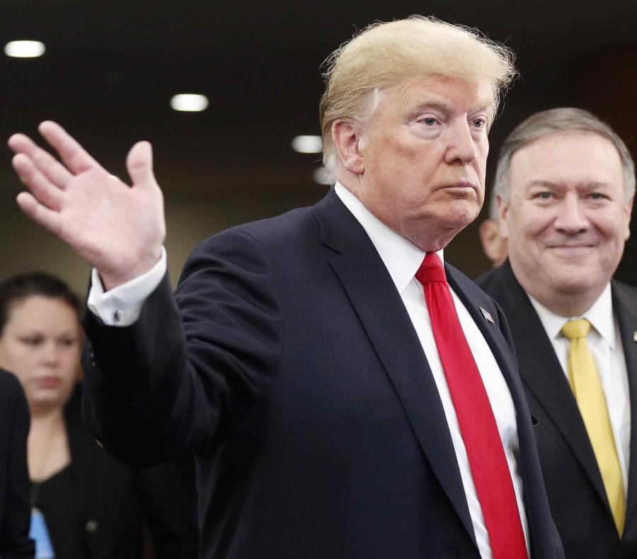 El presidente de los Estados Unidos, Donald Trump, y su secretario de Estado, Mike Pompeo, llegan a un acto celebrado con motivo de la apertura de la 73 sesión de la Asamblea General de Naciones Unidas, en Nueva York. (EFE) (semisquare-x3)