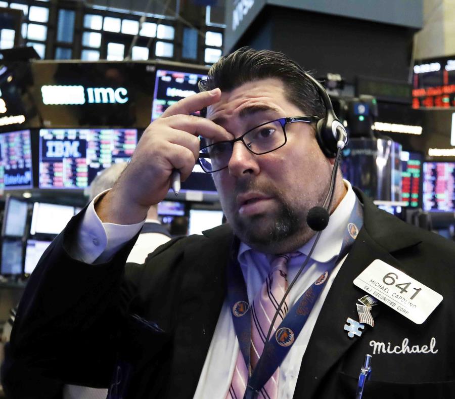 Michael Capolino trabaja en la Bolsa de Valores de Nueva York. (AP) (semisquare-x3)